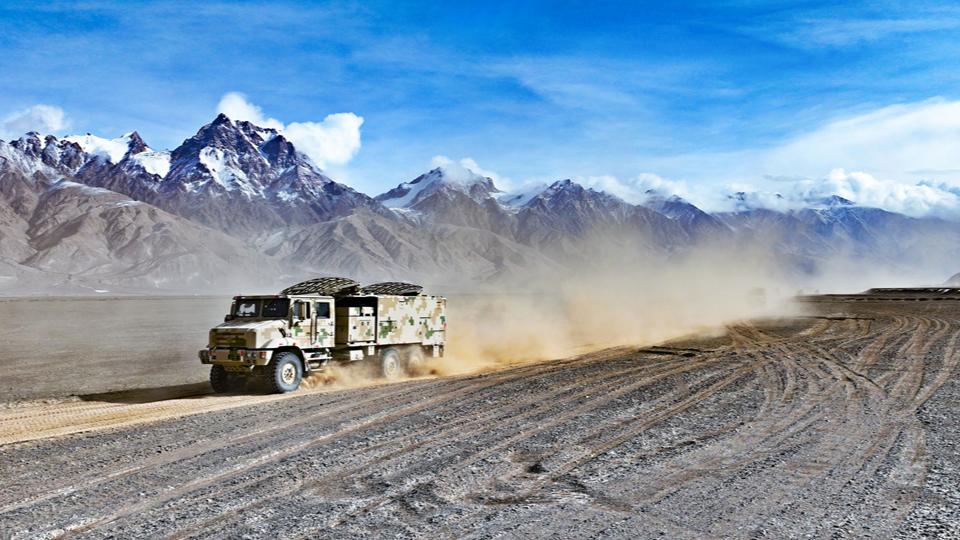 Military vehicles en route to designated training area