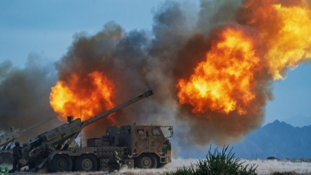 Howitzers fire at targets