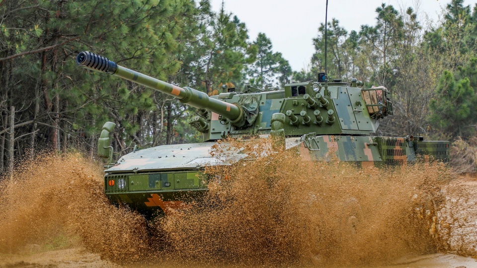 Wheeled armored assault vehicles in live-fire training