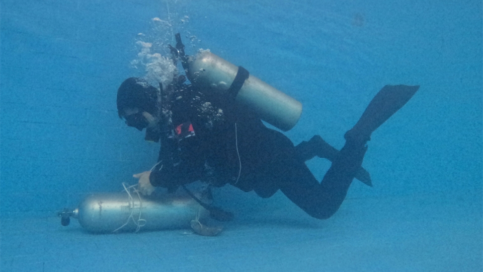 Navy divers  conduct underwater training