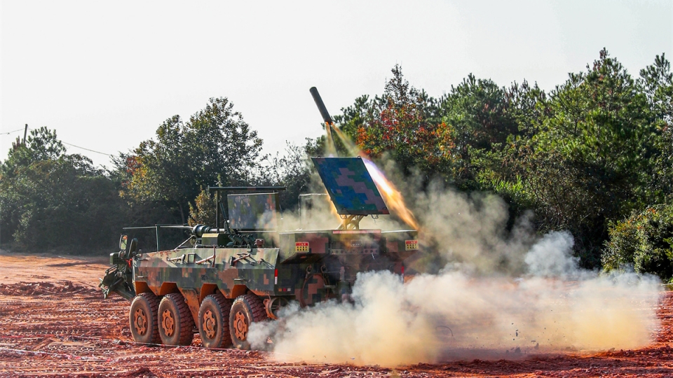 Vehicle fires wire-guided minesweeping line charge