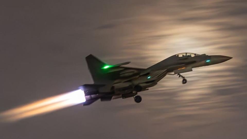 J-16 fighter jet soars into sky