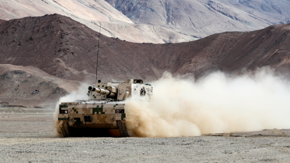 PLZ-07 howitzers march in formation 