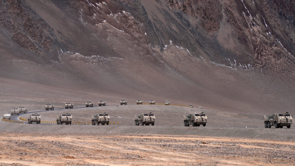 Military vehicles in long-distance maneuver 
