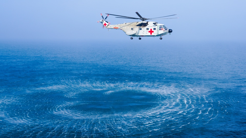 Ship-borne helicopters in training 