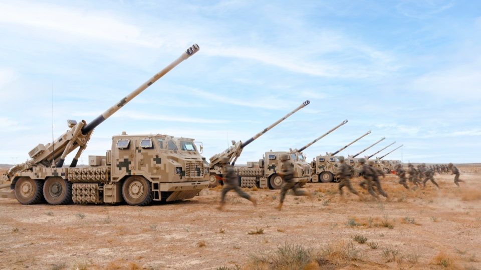 Howitzers fire at mock targets