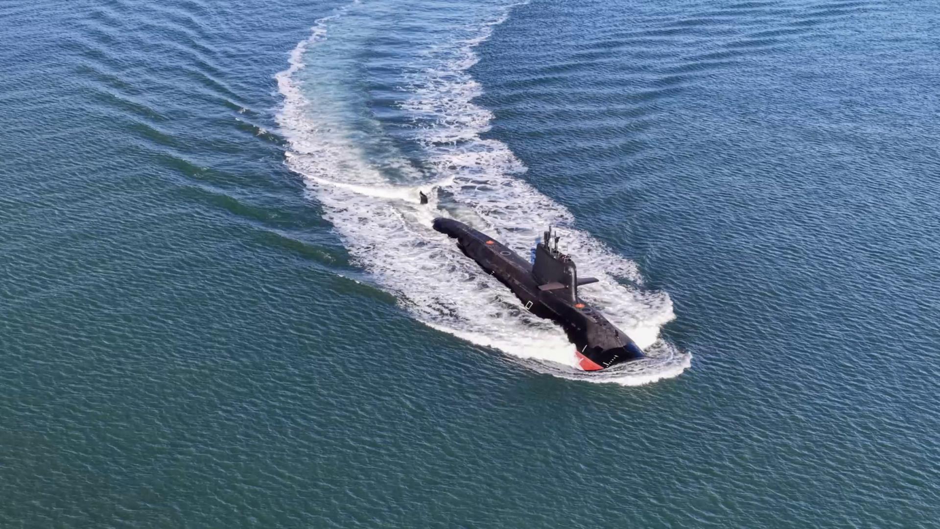 Submarine steams towards the sea