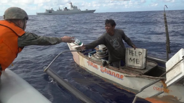 Chinese PLA's naval ship rescues a Philippine fisherman