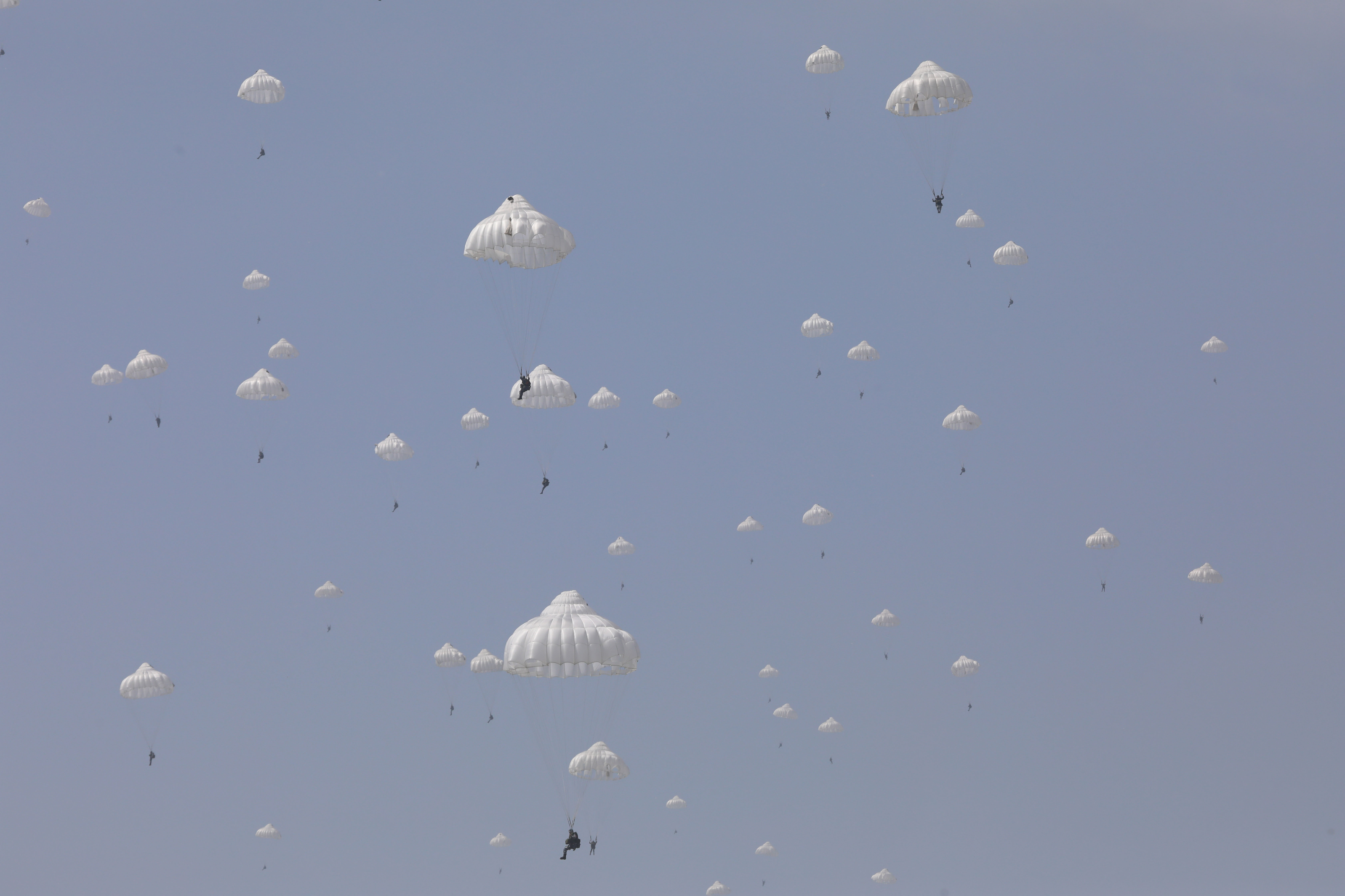 Paratroopers descend to drop zone Ministry of National Defense