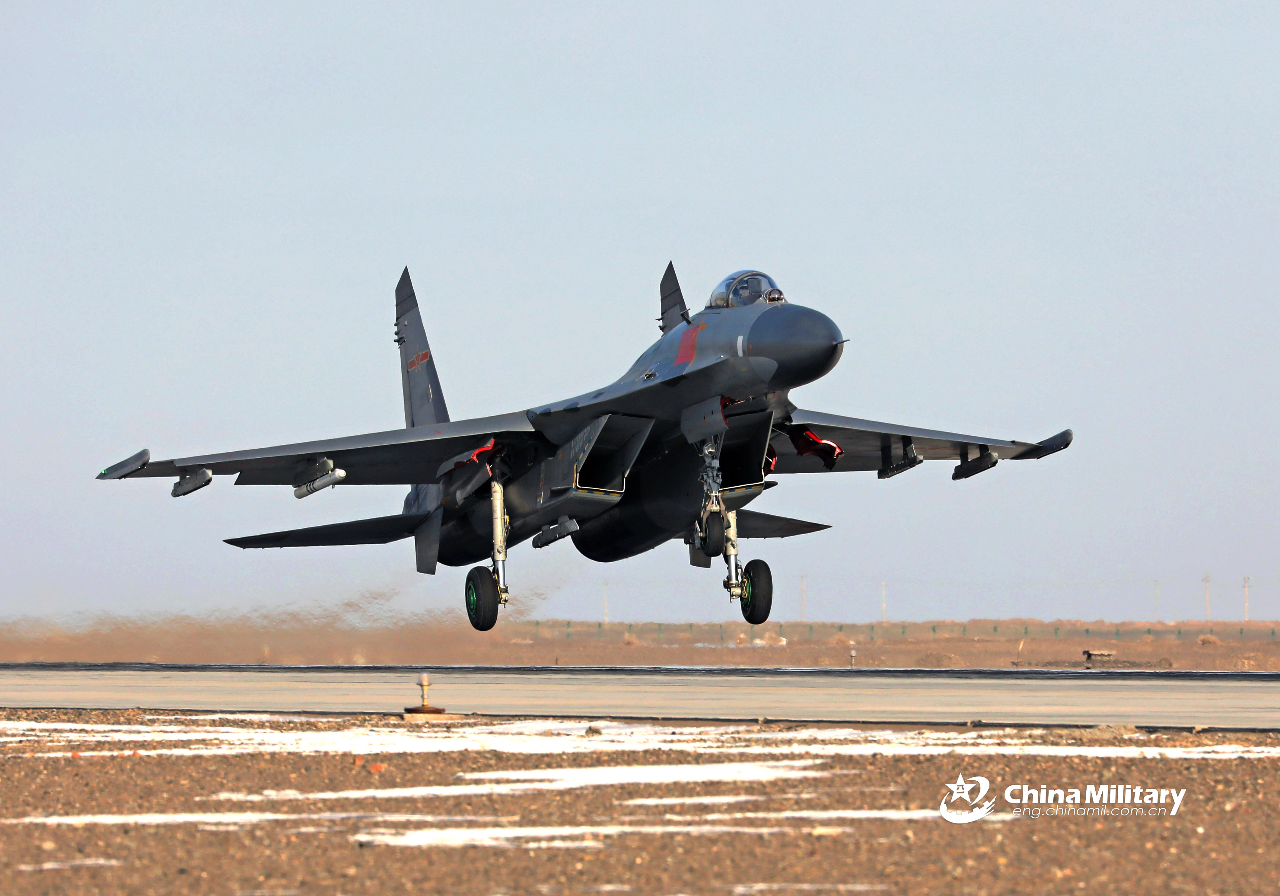 j-11 fighter jets train in desert area