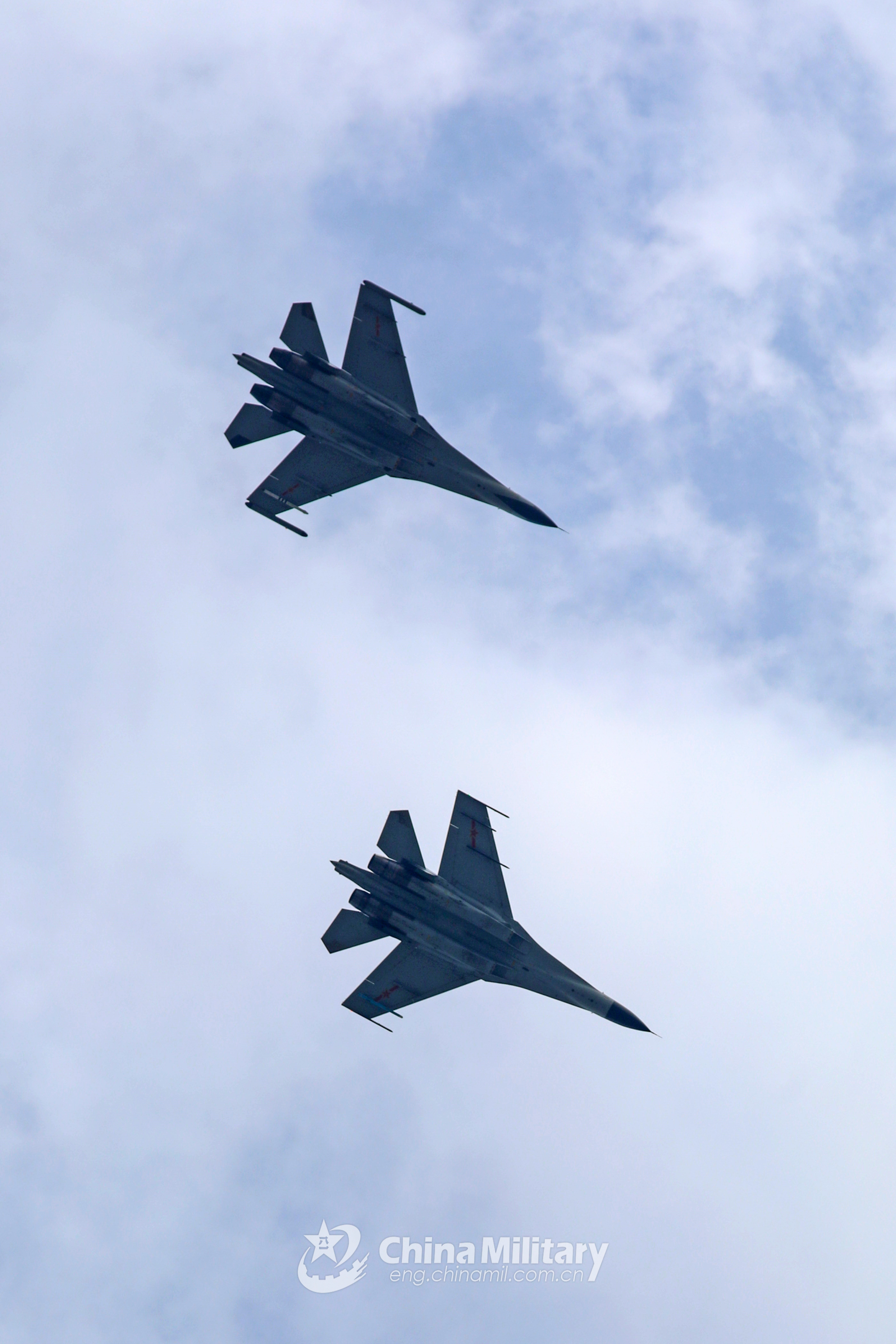 Fleet of fighter jets fly over the sky Ministry of National Defense