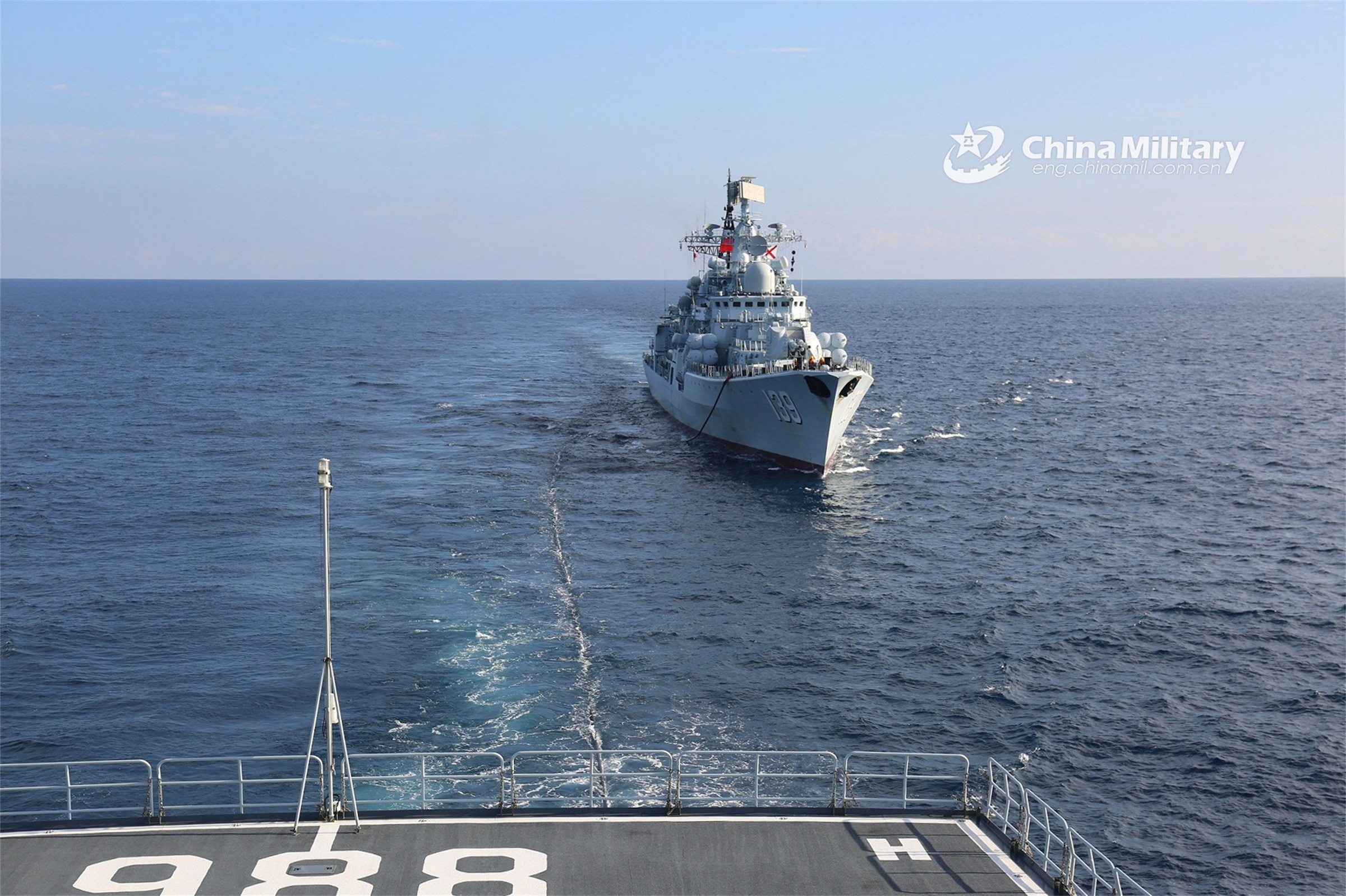 Naval vessels conduct replenishment-at-sea
