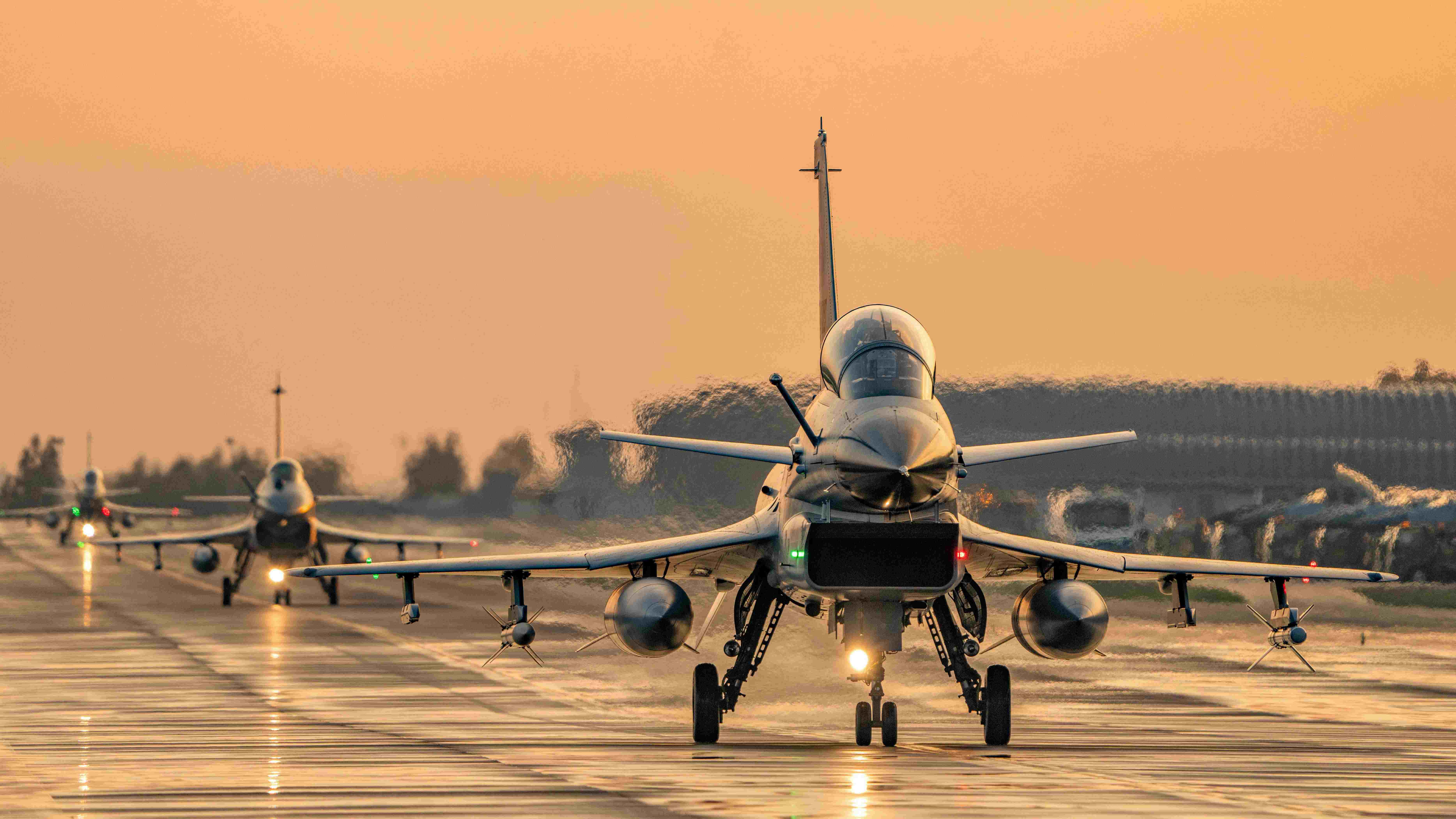 J-10 fighter jets rise up at dawn